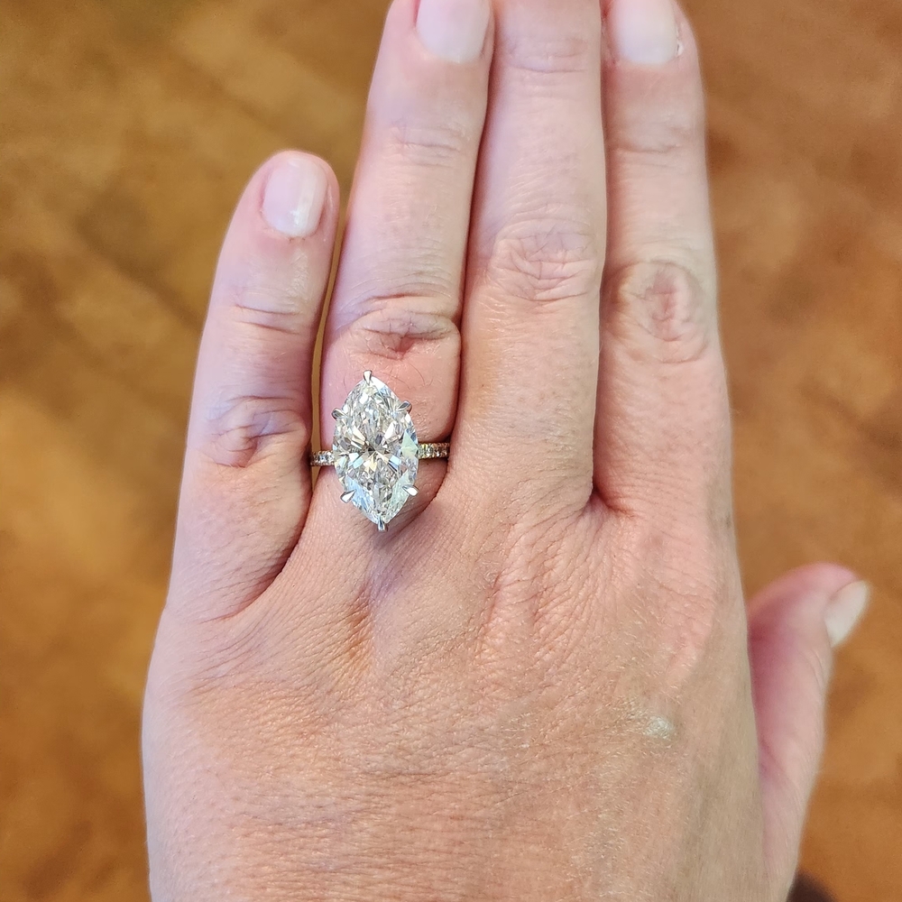 IGI 8 CARAT MARQUISE AND GOLD DIAMOND RING